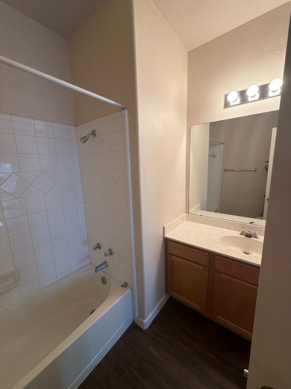 2831 Southampton Way Round Rock, TX 78664 - Photo 12 of 18 a bathroom with a tub sink and mirror