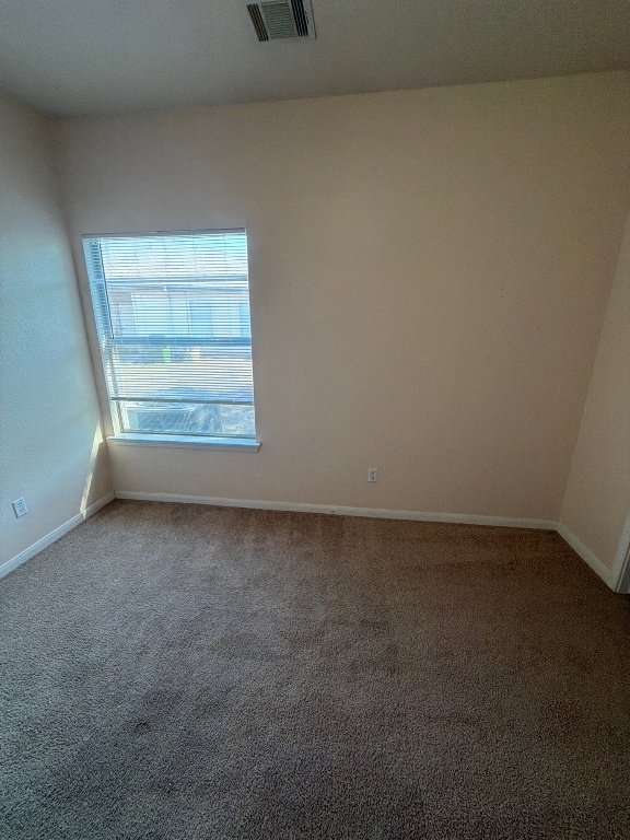 2831 Southampton Way Round Rock, TX 78664 - Photo 17 of 18 an empty room with a window