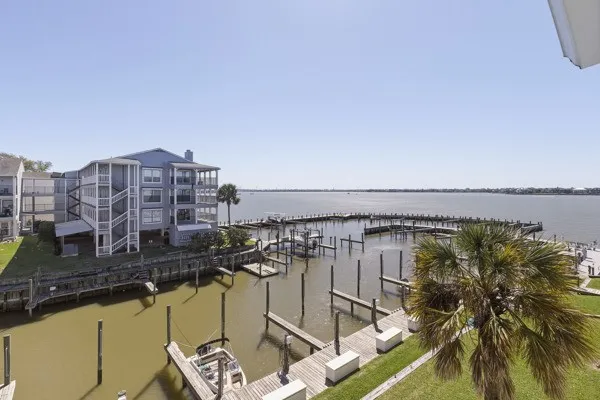 a view of a ocean with tall building