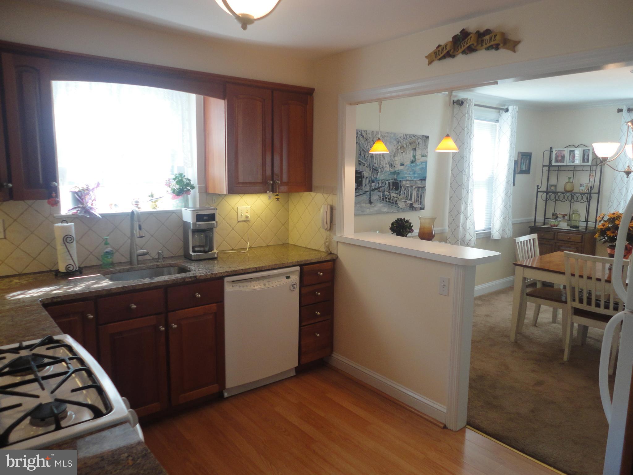 115 West Avenue Springfield, PA 19064 - Photo 11 of 34 Updated Kitchen looking into Dining Room