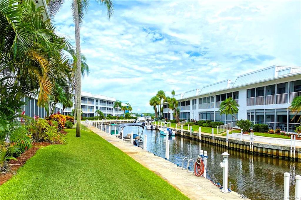 1864 Southwest Palm City Road, Unit 202 Stuart, FL 34994 - Photo 24 of 29 Long views of canal and South Fork of St. Lucie River