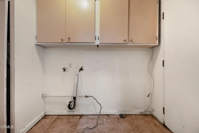 a view of cabinets with staircase