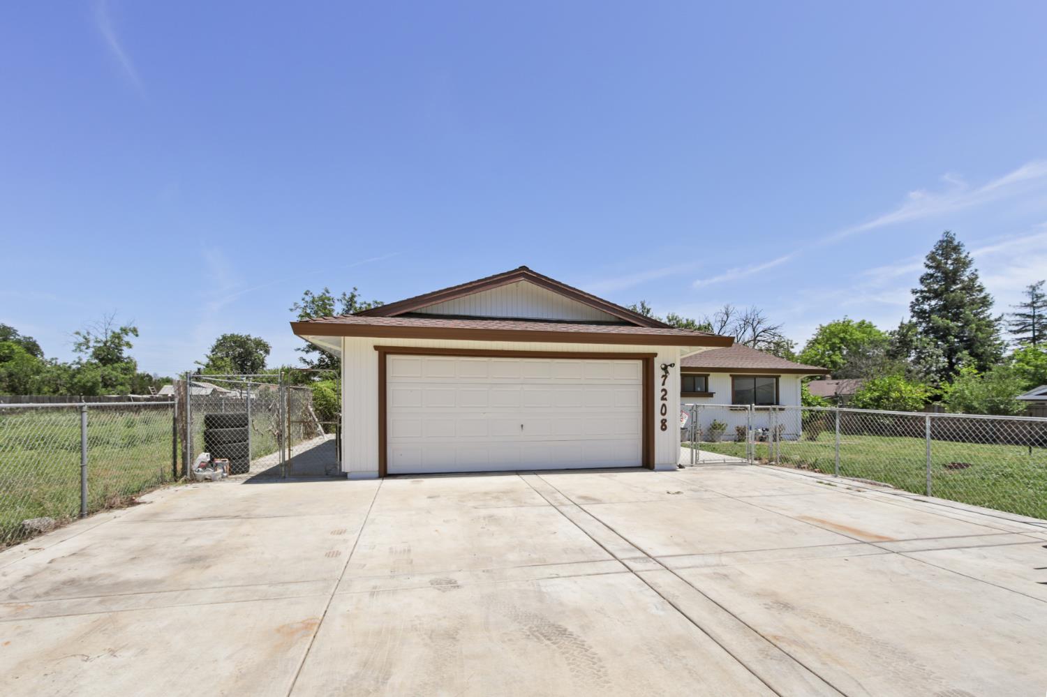 7208 7th Street Rio Linda, CA 95673 - Photo 41 of 41 a front view of a house with a yard