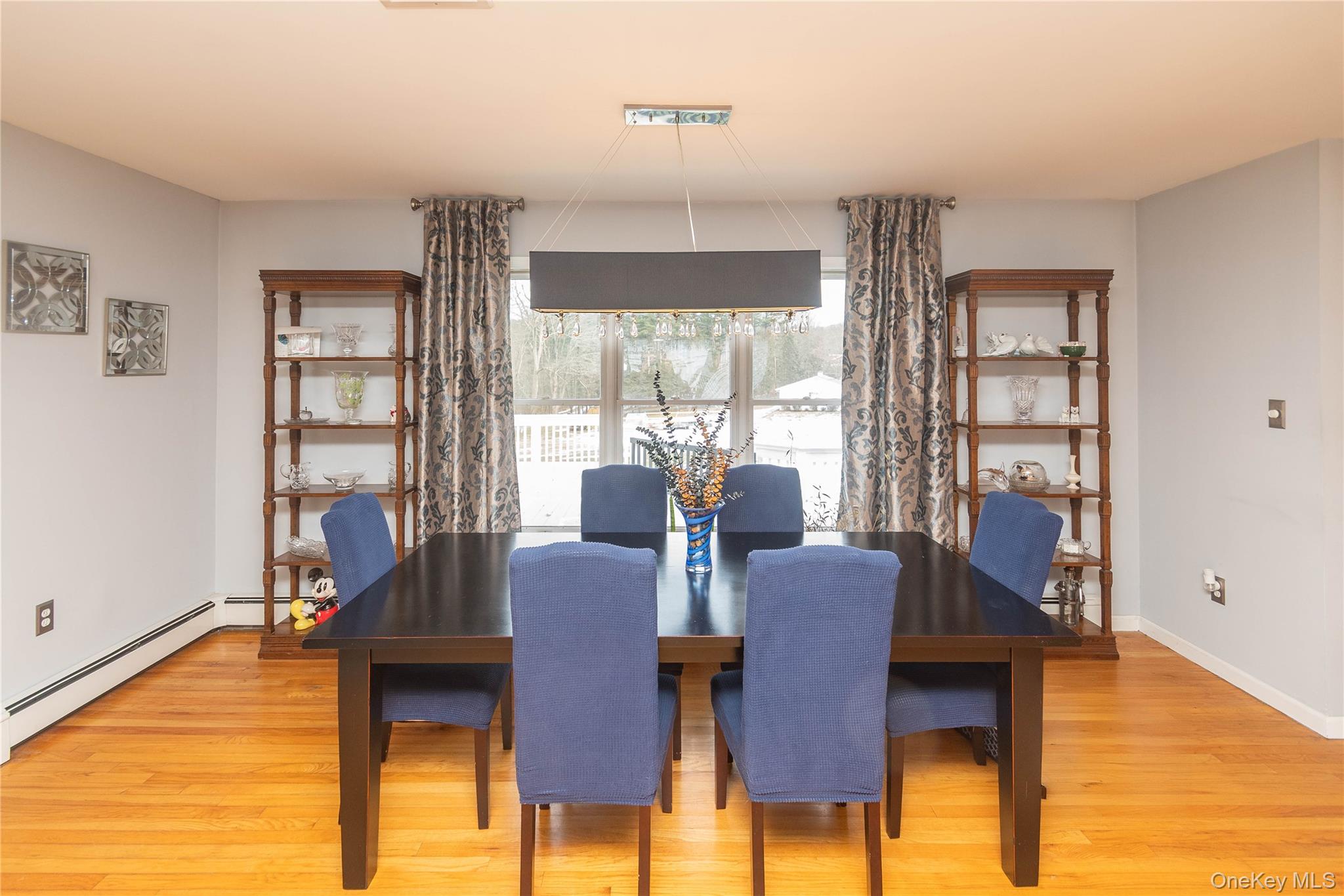 503 Chestnut Ridge Road Dover Plains, NY 12522 - Photo 16 of 41 a view of a dining room with furniture window and wooden floor