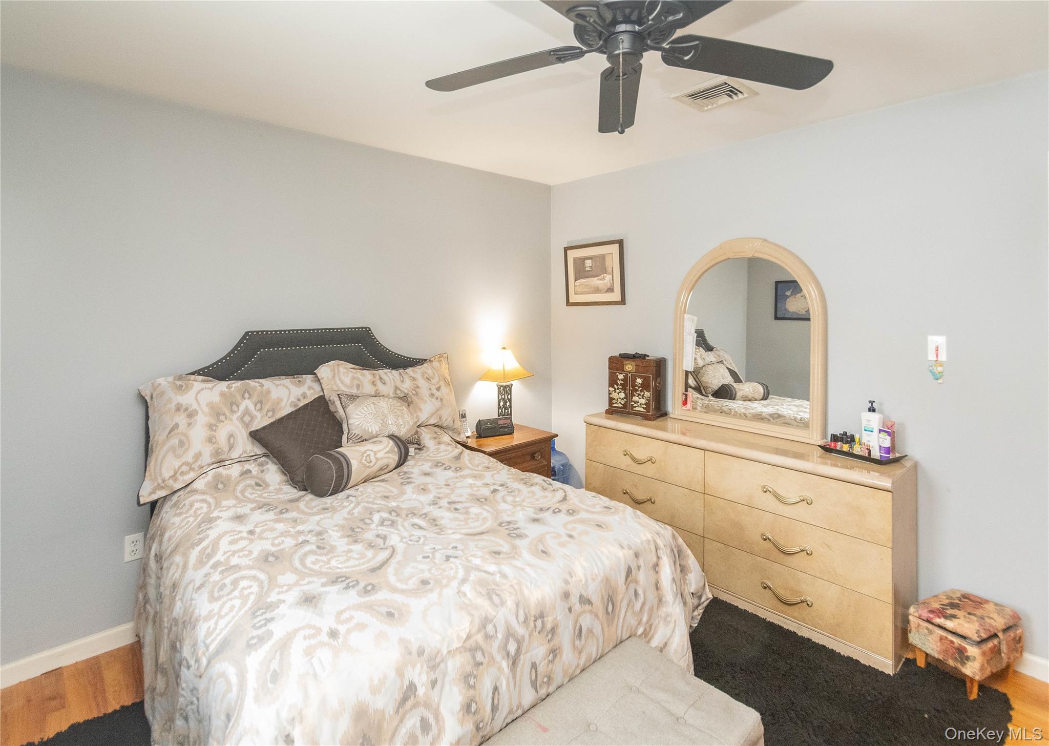 503 Chestnut Ridge Road Dover Plains, NY 12522 - Photo 26 of 41 a bedroom with a bed and a dresser