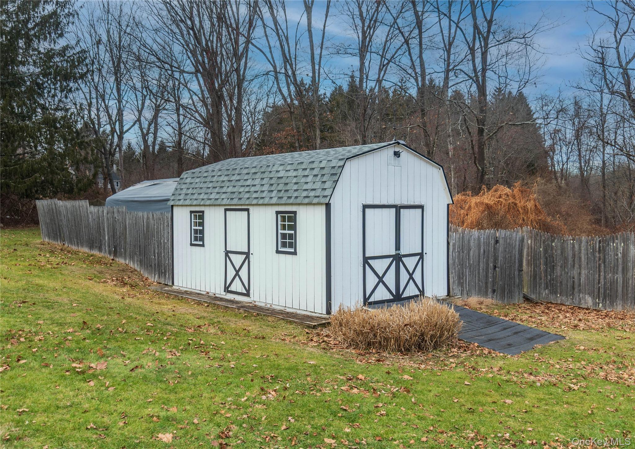 503 Chestnut Ridge Road Dover Plains, NY 12522 - Photo 37 of 41 a front view of house with yard and trees in the background