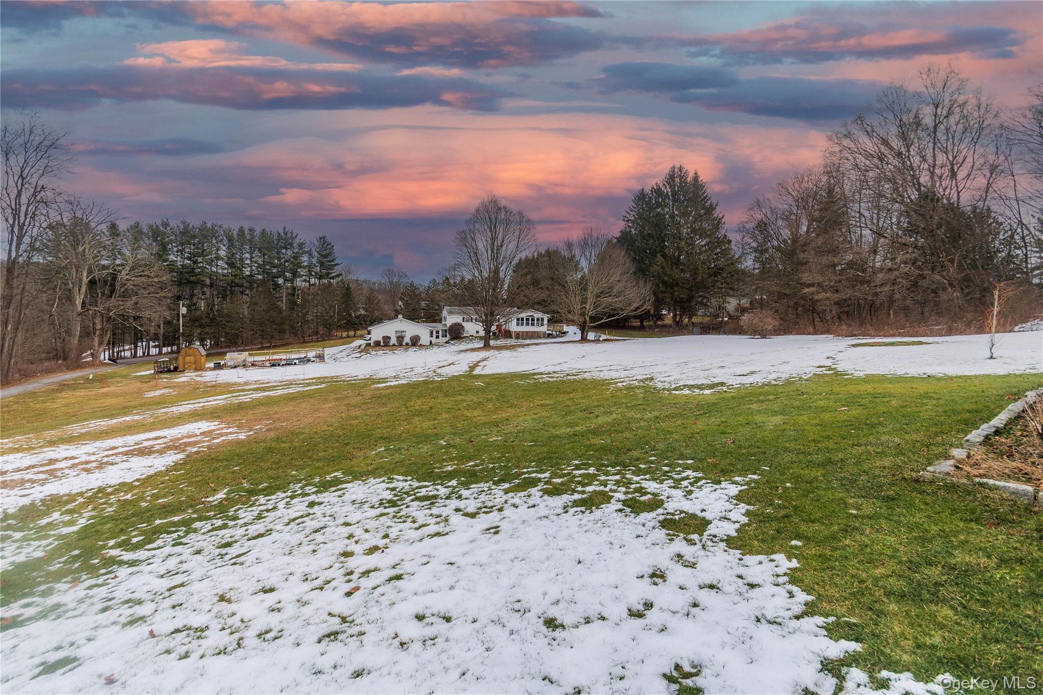 503 Chestnut Ridge Road Dover Plains, NY 12522 - Photo 7 of 41 a view of yard with swimming pool and trees in the background