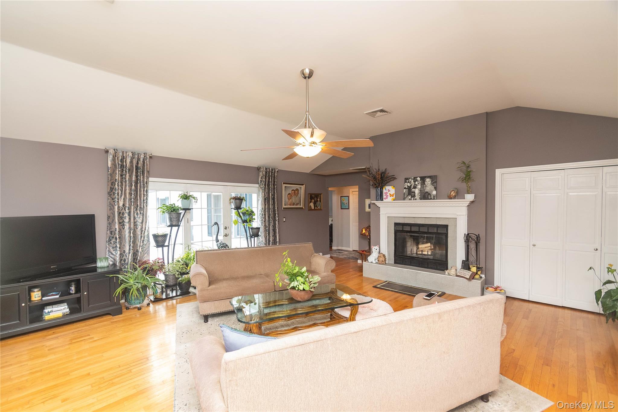 503 Chestnut Ridge Road Dover Plains, NY 12522 - Photo 10 of 41 a living room with fireplace furniture and a flat screen tv