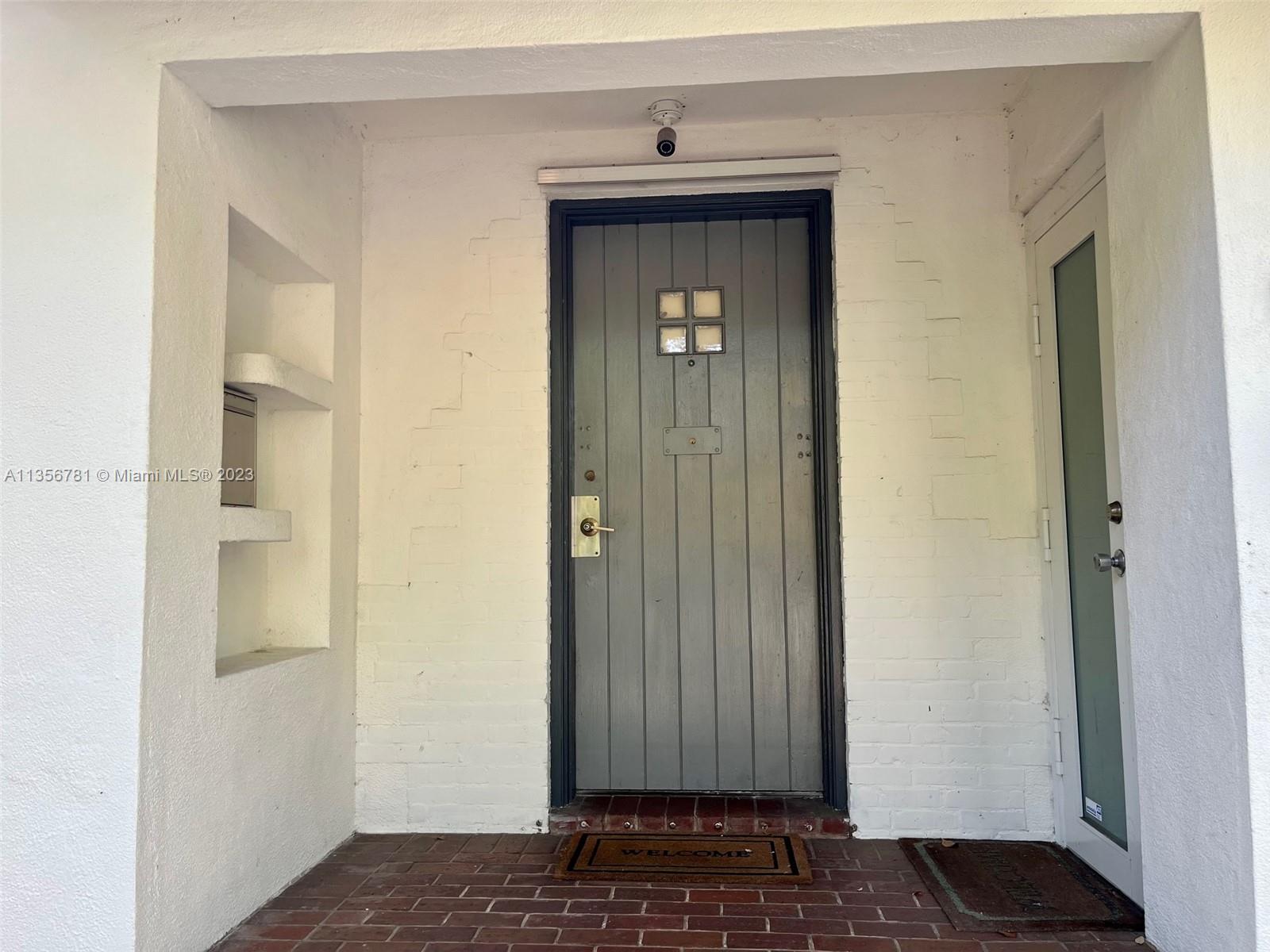 Bayside Miami, FL 33138 - Photo 2 of 8 a view of a hallway with wooden floor
