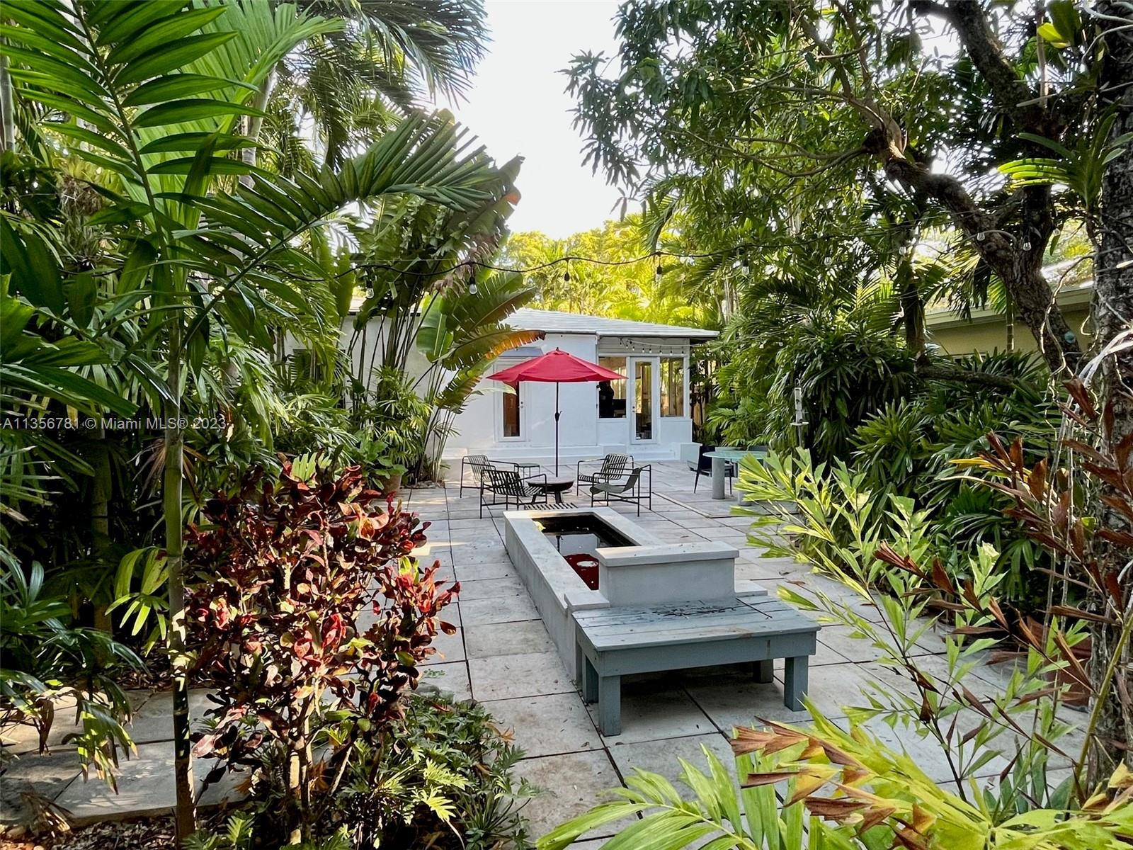 Bayside Miami, FL 33138 - Photo 6 of 8 a view of a chairs and table in a patio