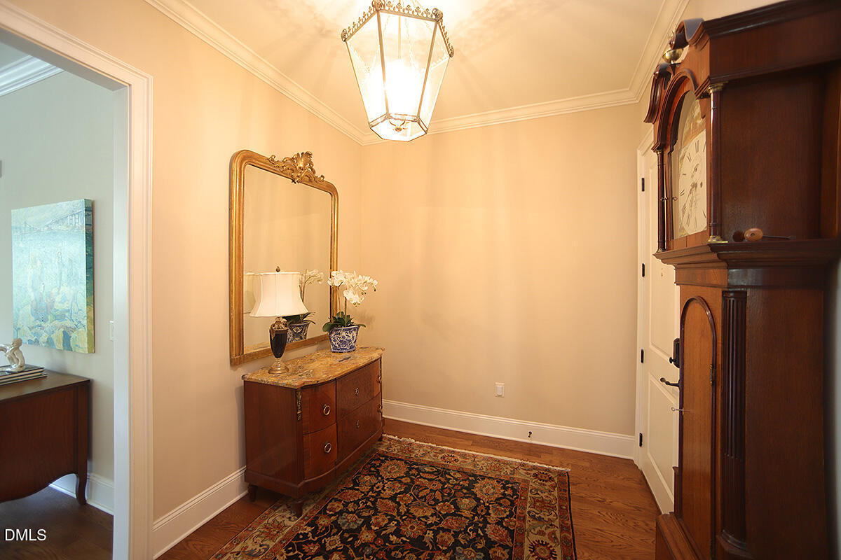 620 Wade Avenue, Unit 206 Raleigh, NC 27605 - Photo 18 of 42 a room with water heater and wooden cabinets