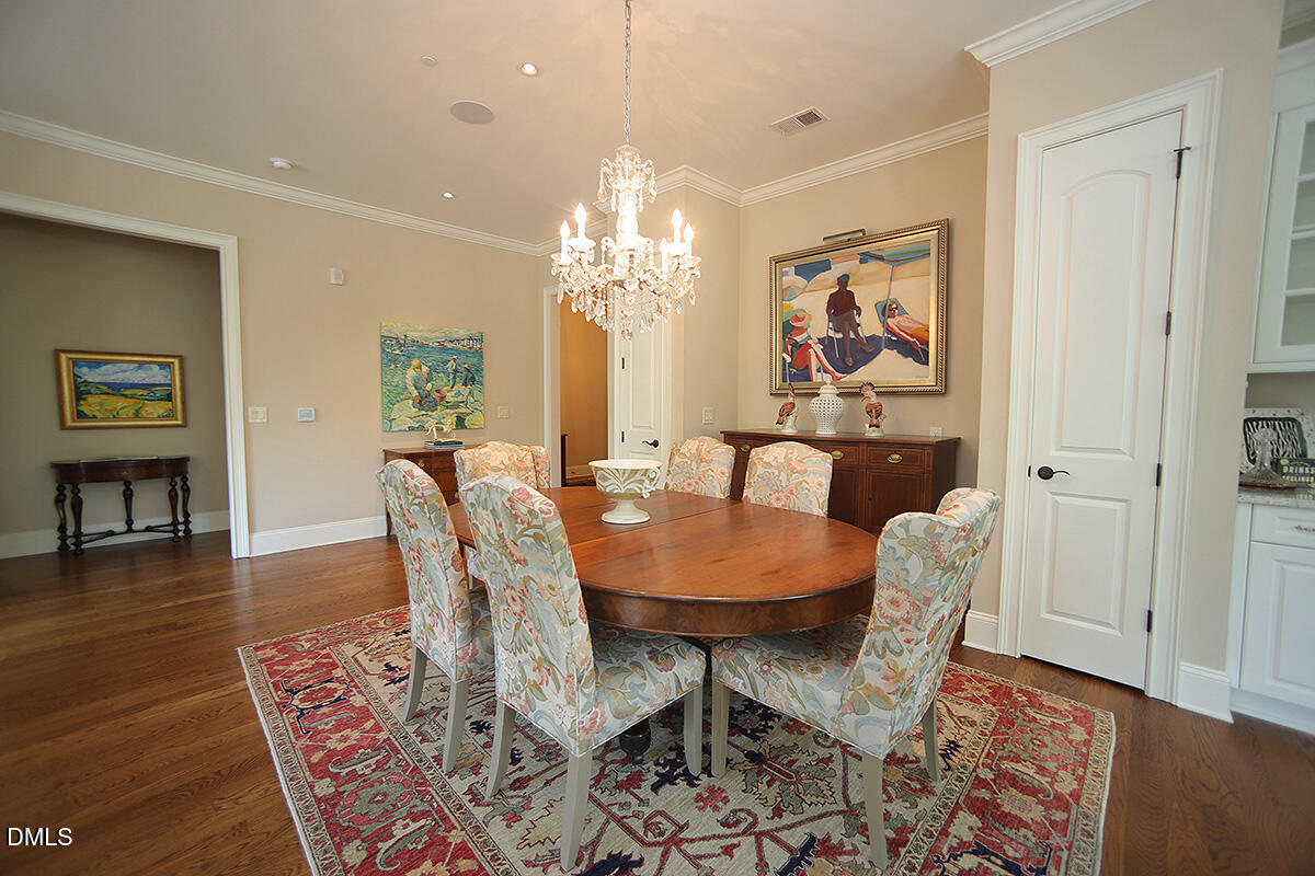 620 Wade Avenue, Unit 206 Raleigh, NC 27605 - Photo 22 of 42 a view of a dining room with furniture
