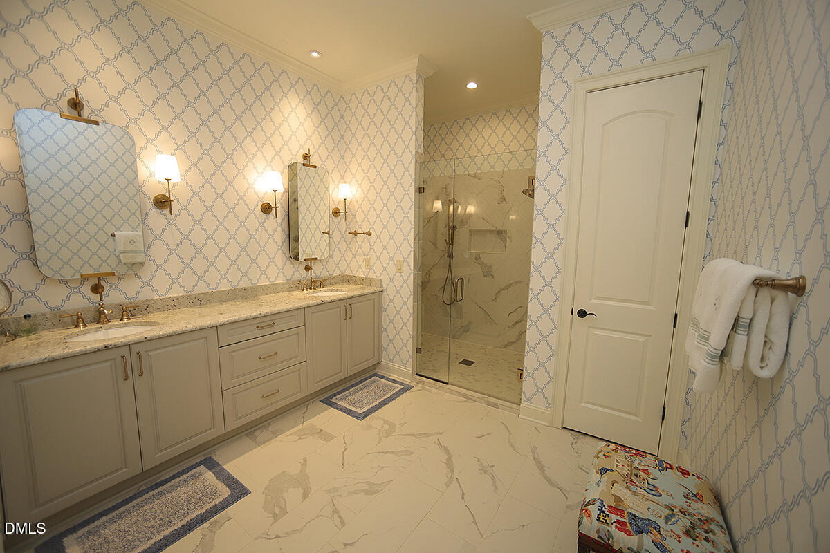 620 Wade Avenue, Unit 206 Raleigh, NC 27605 - Photo 34 of 42 a spacious bathroom with a shower sink and mirror