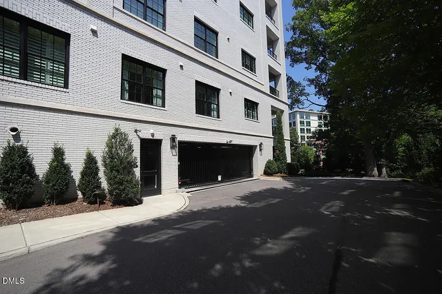 a front view of a house with yard