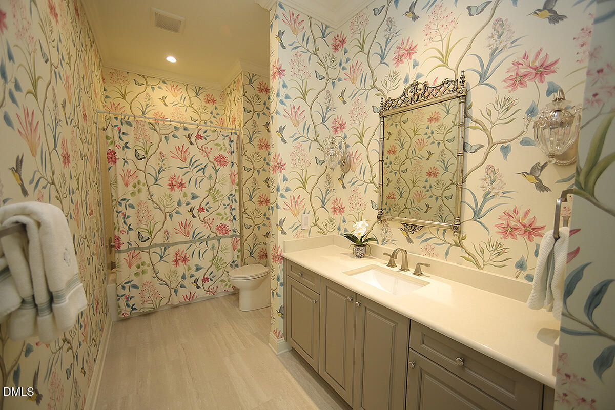 620 Wade Avenue, Unit 206 Raleigh, NC 27605 - Photo 41 of 42 a bathroom with a sink and a mirror