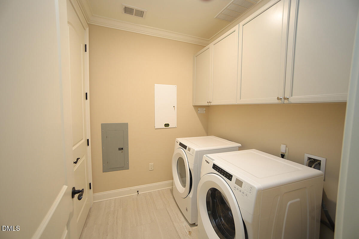 620 Wade Avenue, Unit 206 Raleigh, NC 27605 - Photo 42 of 42 a view of storage and utility room with washer and dryer