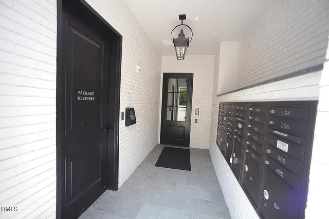 a view of a hallway with windows