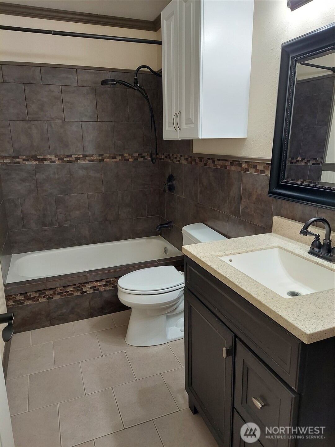 405 Strand Road Ephrata, WA 98823 - Photo 17 of 26 a bathroom with a sink a toilet and a mirror