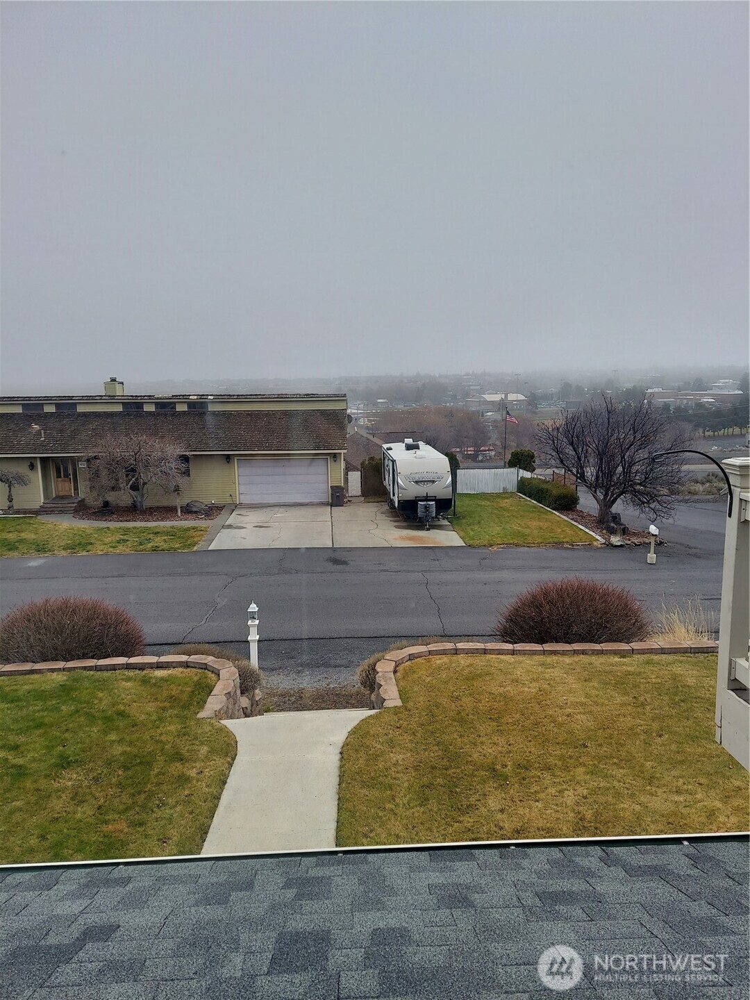 405 Strand Road Ephrata, WA 98823 - Photo 2 of 26 a view of swimming pool with a yard and seating space