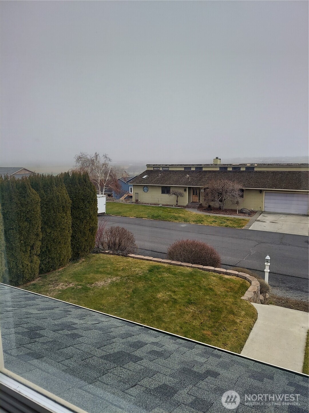 405 Strand Road Ephrata, WA 98823 - Photo 3 of 26 a view of a lake with a large building