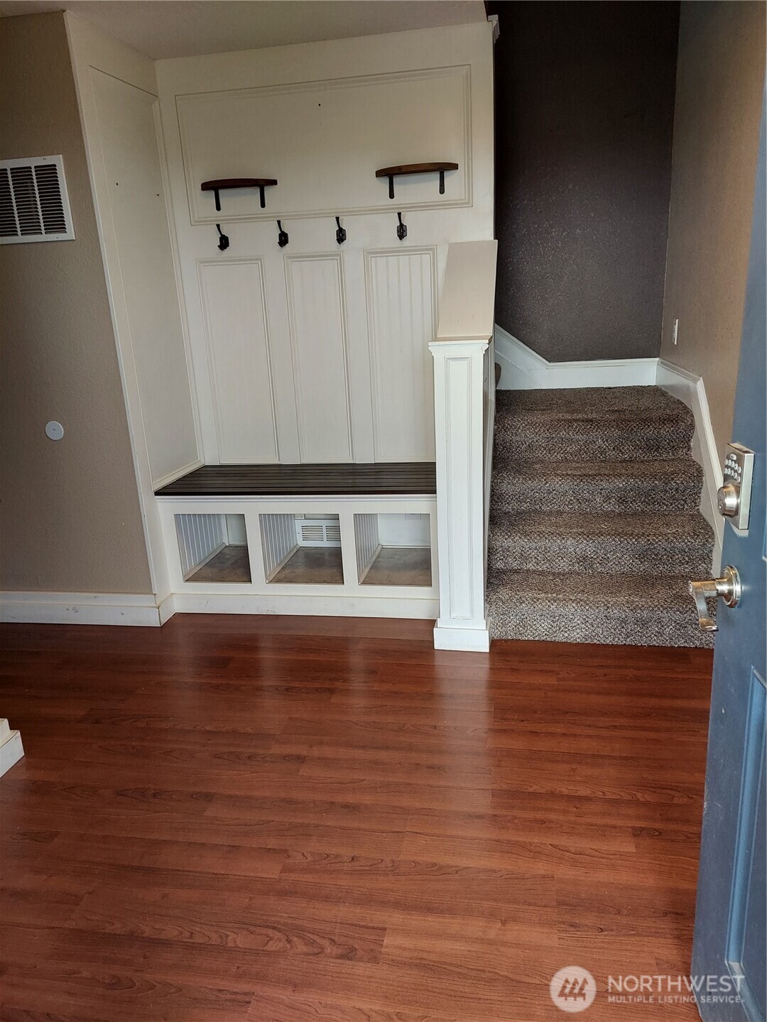 405 Strand Road Ephrata, WA 98823 - Photo 6 of 26 a view of water heater room with wooden floor