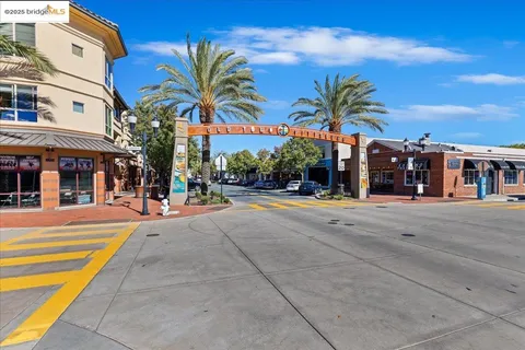 a view of a building with a yard