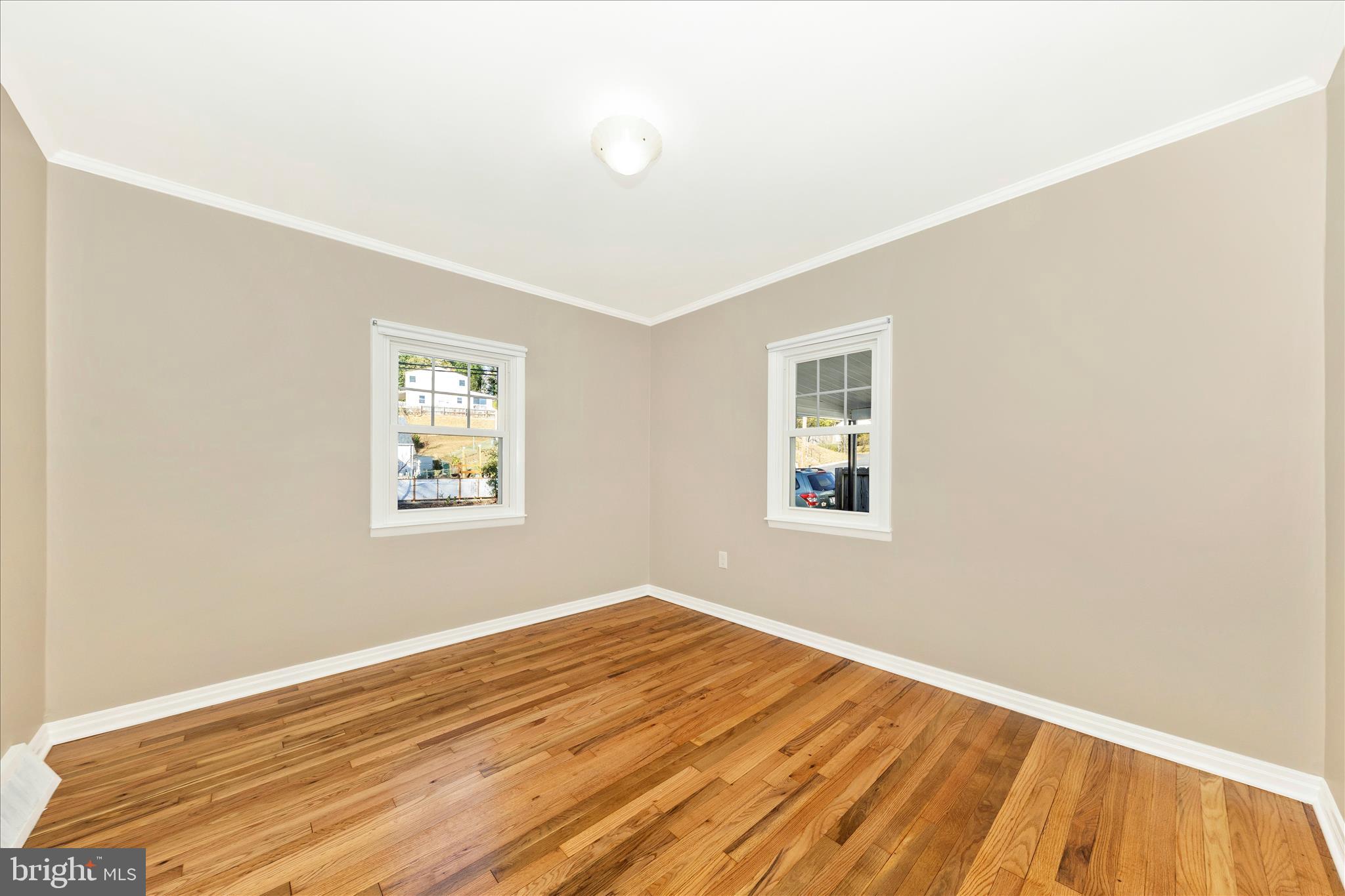 4410 Fernhill Road Silver Spring, MD 20906 - Photo 17 of 49 a view of a room with wooden floor and a window