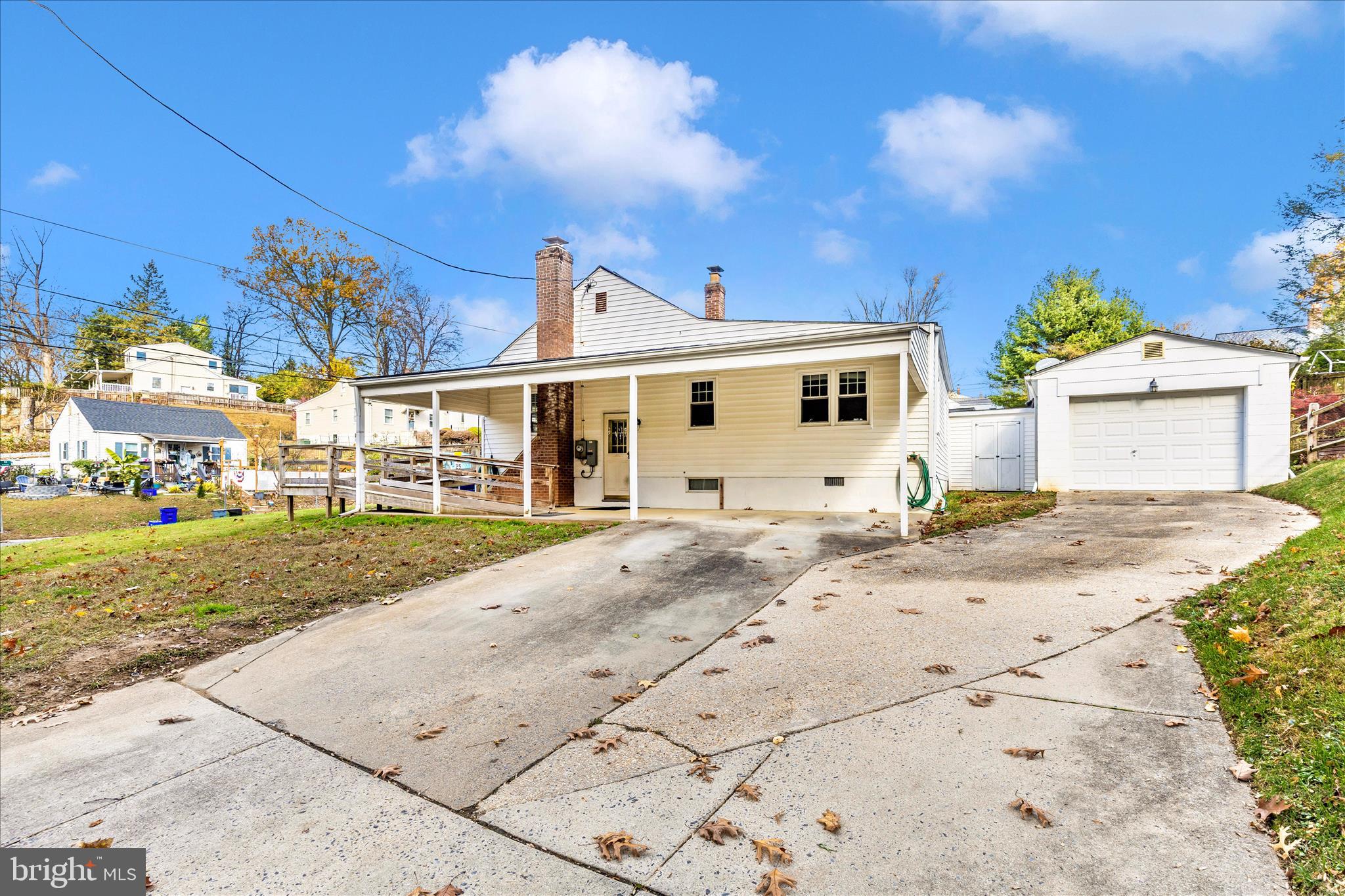 4410 Fernhill Road Silver Spring, MD 20906 - Photo 35 of 49 a view of a yard with cars