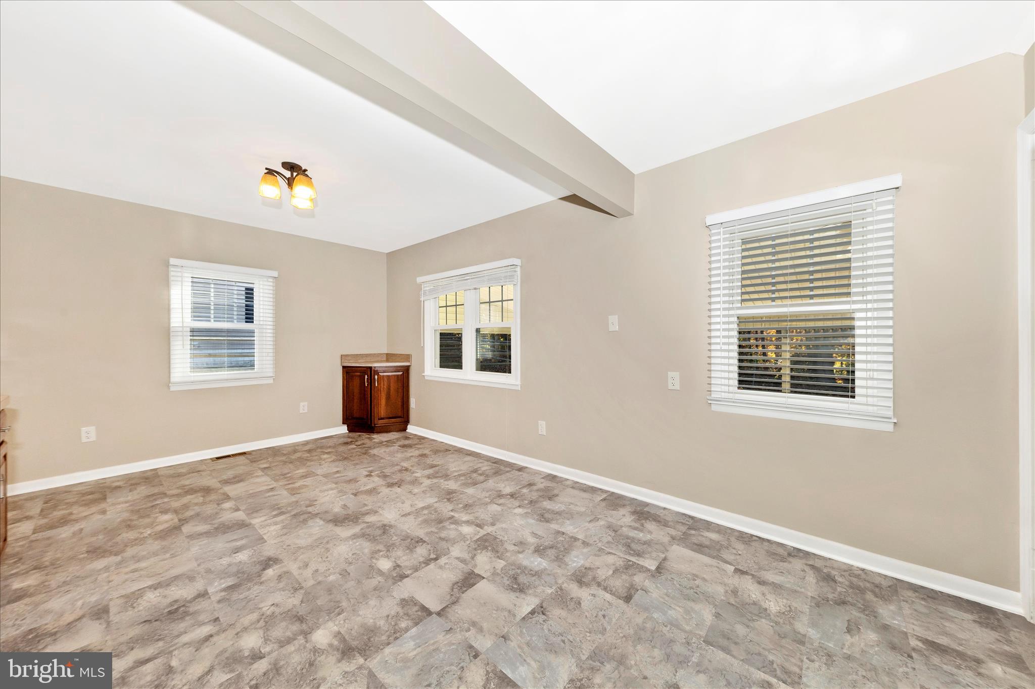 4410 Fernhill Road Silver Spring, MD 20906 - Photo 9 of 49 an empty room with windows