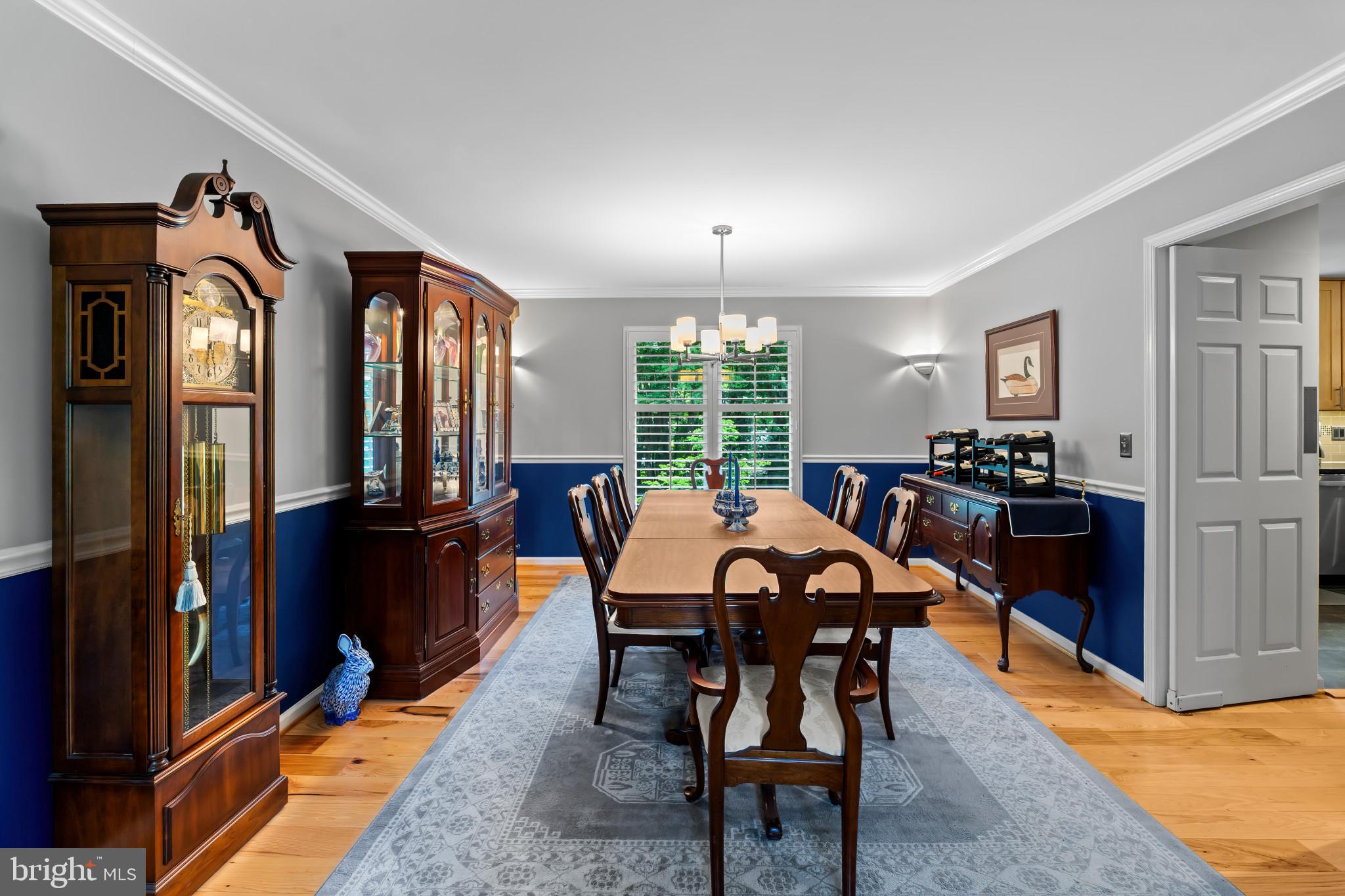 10821 Braeburn Road Columbia, MD 21044 - Photo 26 of 64 a view of a dining room with furniture