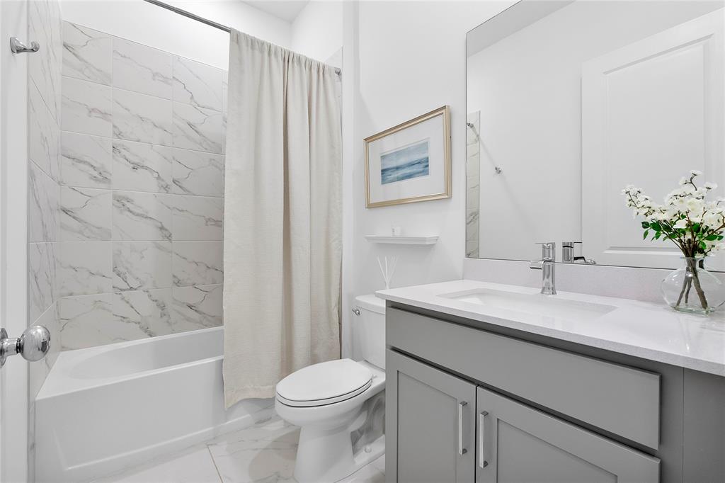 1131 Chisel Plow Chase Loxahatchee, FL 33470 - Photo 11 of 72 a bathroom with a sink a toilet and shower