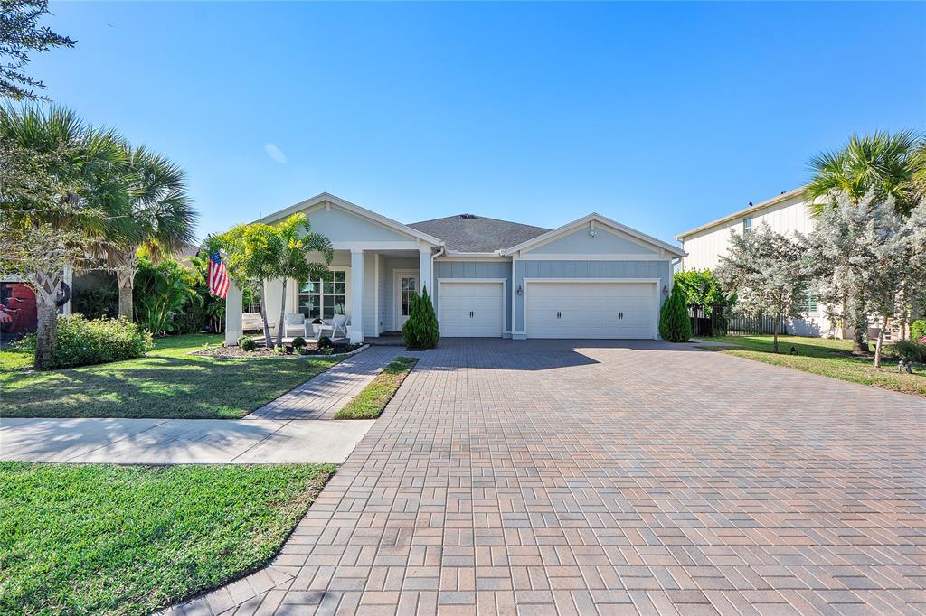 1131 Chisel Plow Chase Loxahatchee, FL 33470 - Photo 3 of 72 a view of a house with a yard and large tree