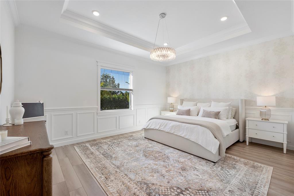 1131 Chisel Plow Chase Loxahatchee, FL 33470 - Photo 35 of 72 a spacious bedroom with a large bed and a window