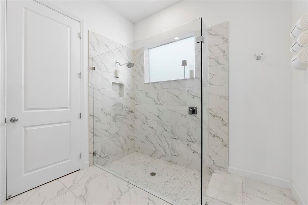 1131 Chisel Plow Chase Loxahatchee, FL 33470 - Photo 37 of 72 a bathroom with a shower and a glass door