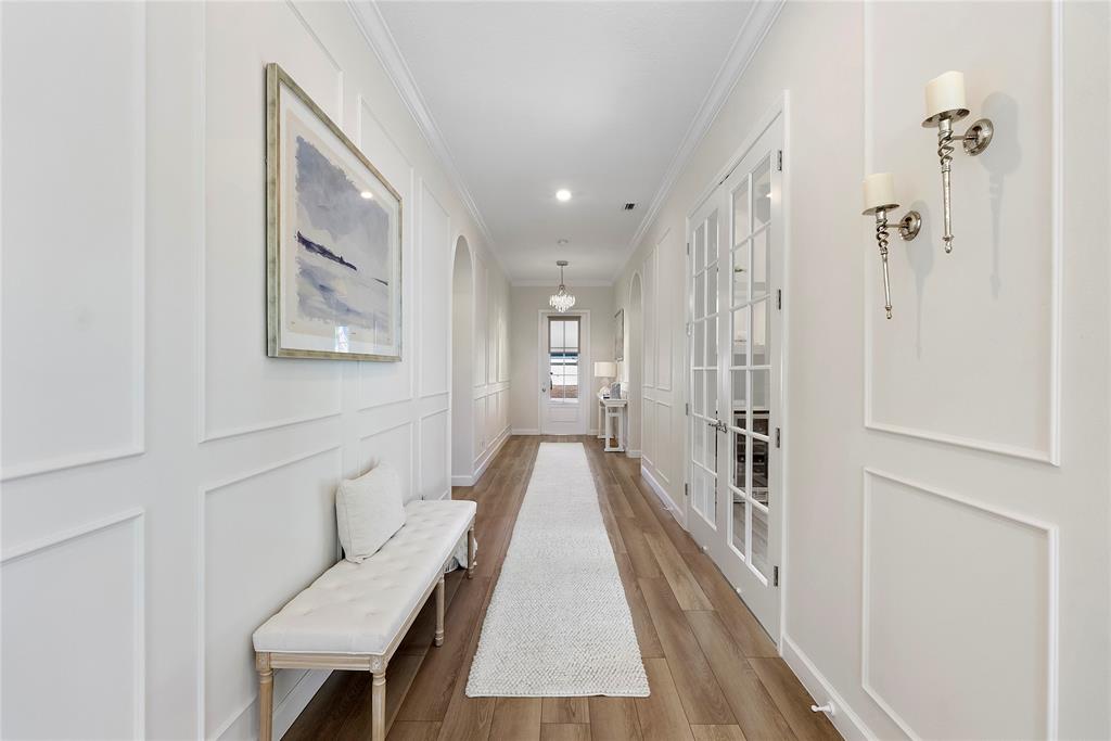 1131 Chisel Plow Chase Loxahatchee, FL 33470 - Photo 41 of 72 a view of a hallway with wooden floor and staircase