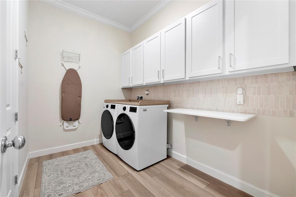 1131 Chisel Plow Chase Loxahatchee, FL 33470 - Photo 47 of 72 a utility room with dryer and washer