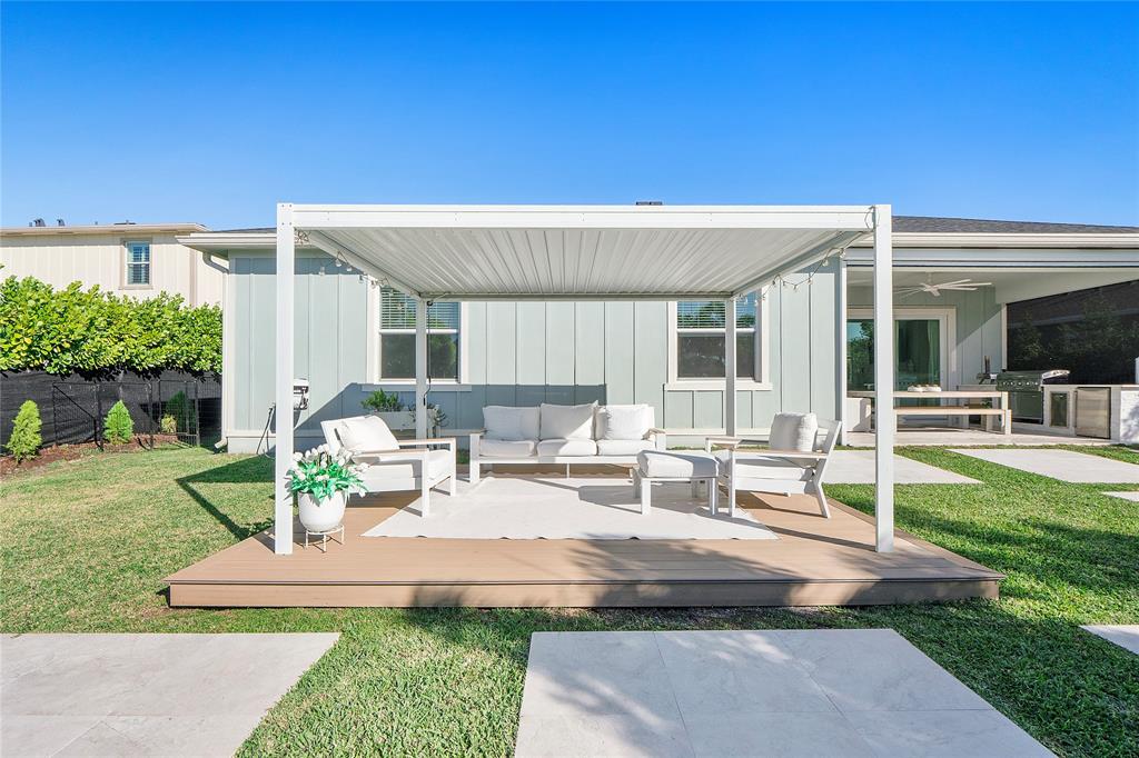 1131 Chisel Plow Chase Loxahatchee, FL 33470 - Photo 60 of 72 a view of a house with backyard and sitting area