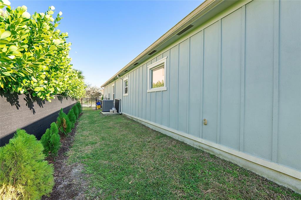 1131 Chisel Plow Chase Loxahatchee, FL 33470 - Photo 61 of 72 a backyard of a house with outdoor seating