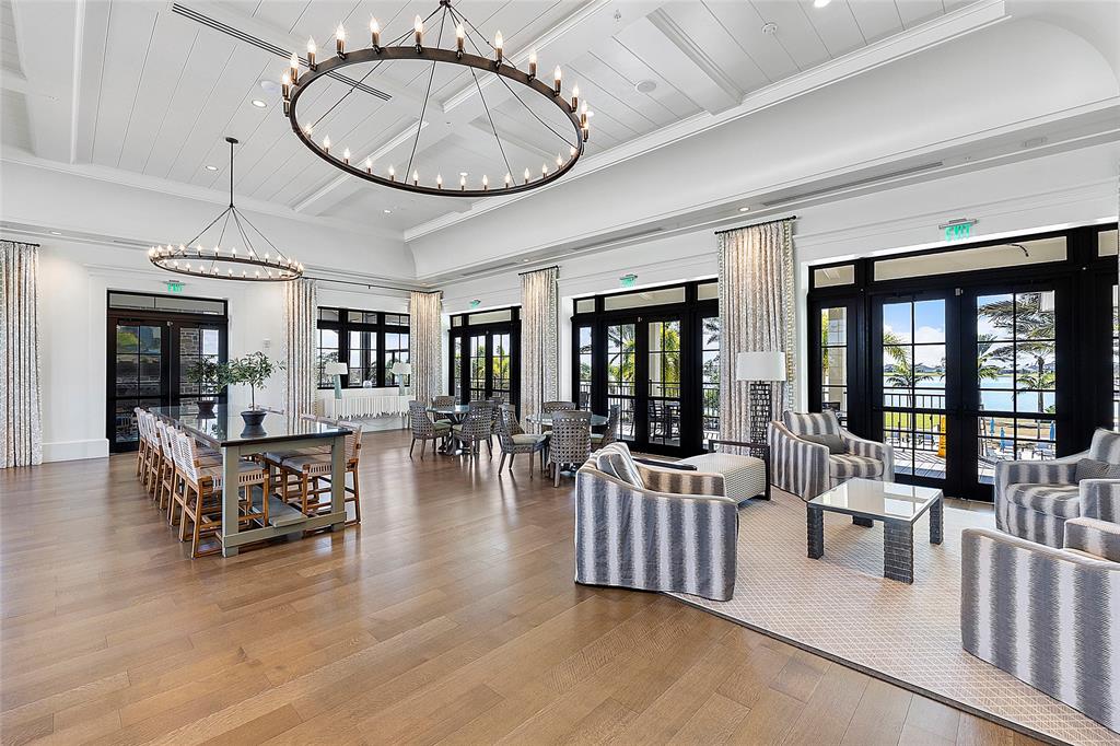 1131 Chisel Plow Chase Loxahatchee, FL 33470 - Photo 71 of 72 a view of a dining room with furniture window and wooden floor