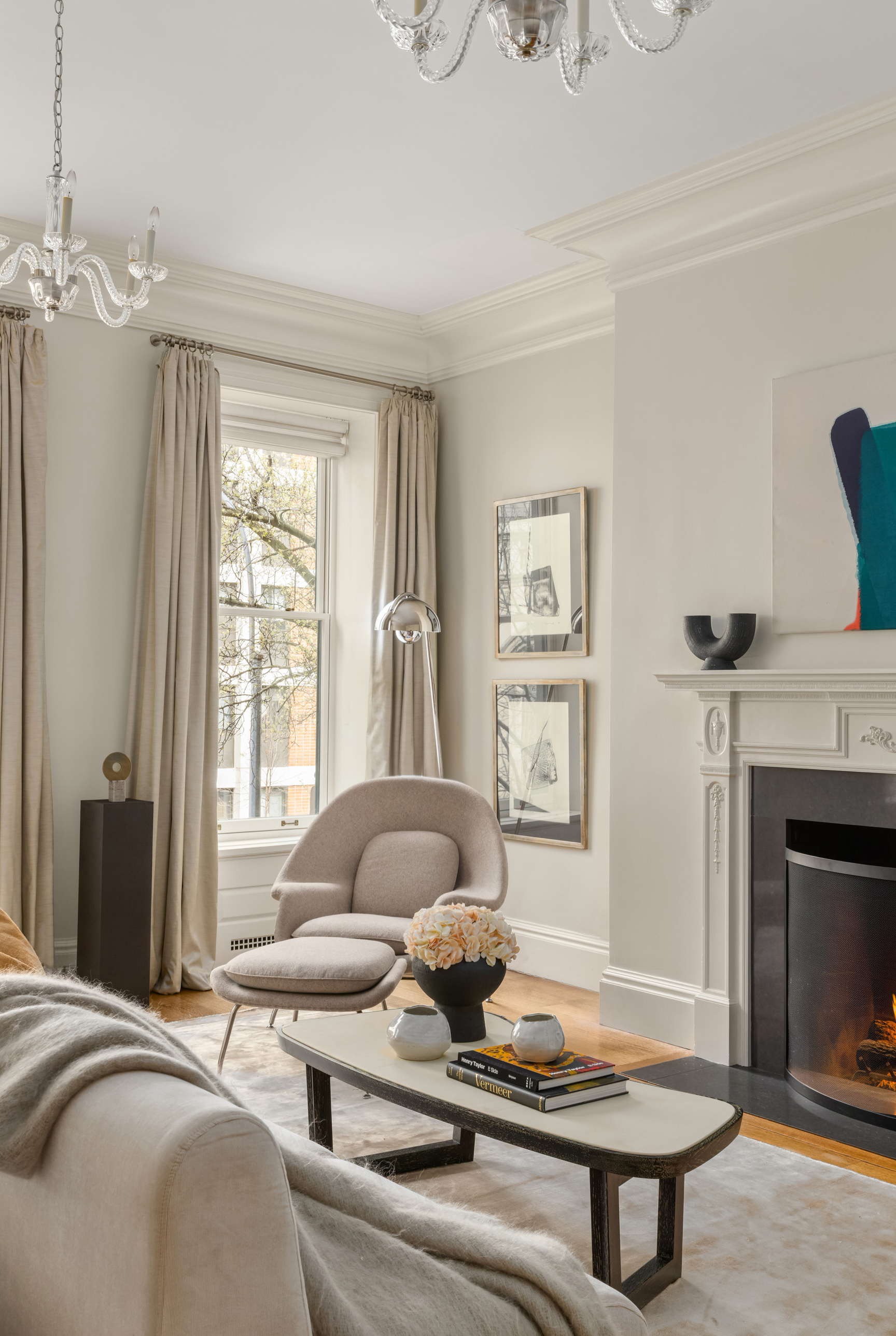 Undisclosed Address Manhattan, NY 10021 - Photo 12 of 25 a living room with furniture and a fireplace