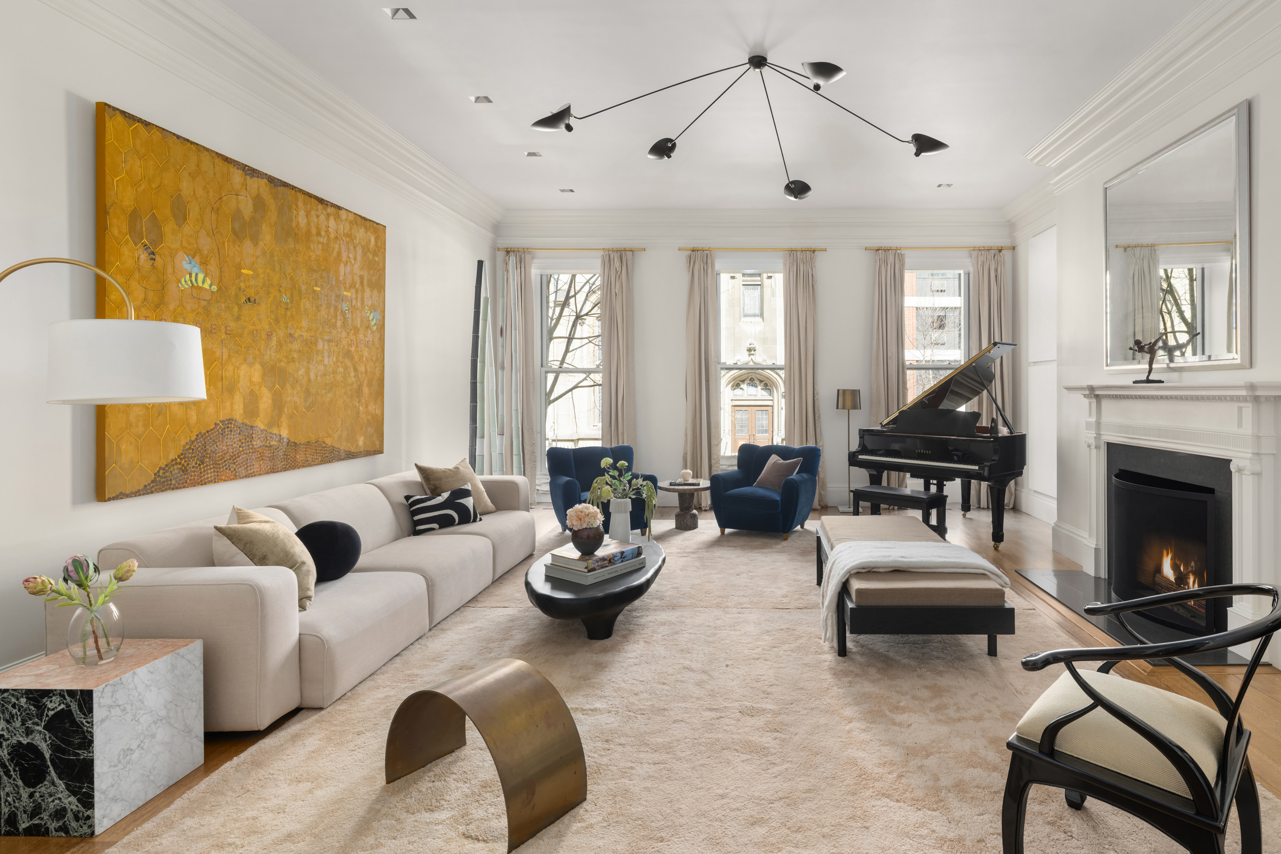 Undisclosed Address Manhattan, NY 10021 - Photo 7 of 25 a living room with furniture or couch and a chandelier