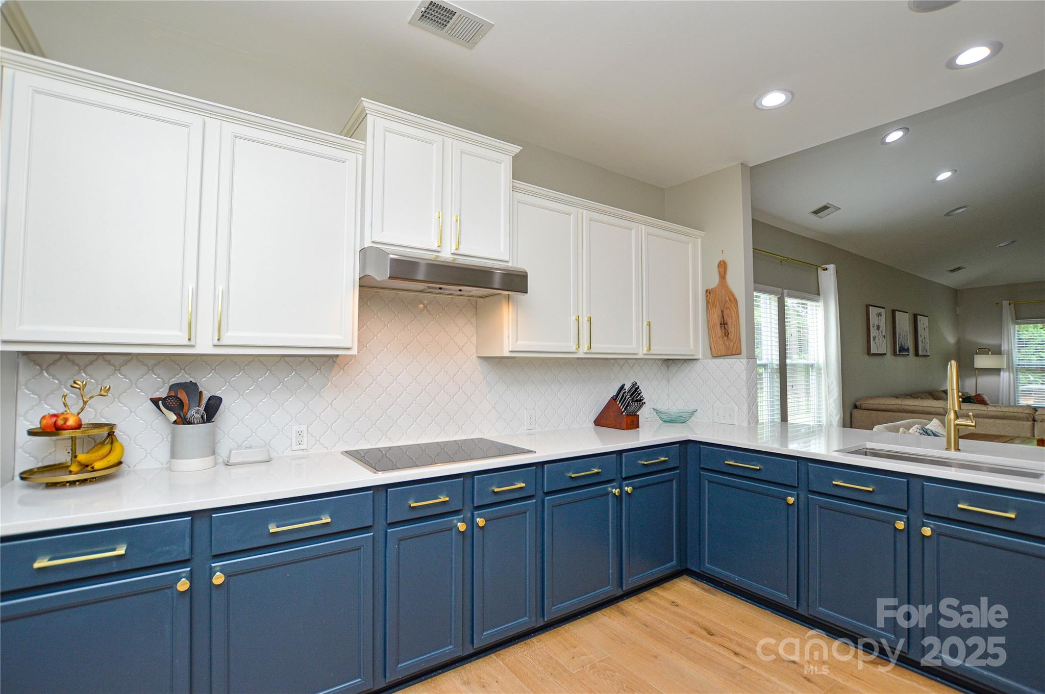 86506 Arrington Road Lancaster, SC 29720 - Photo 12 of 48 a kitchen with stainless steel appliances granite countertop a sink dishwasher window and cabinets