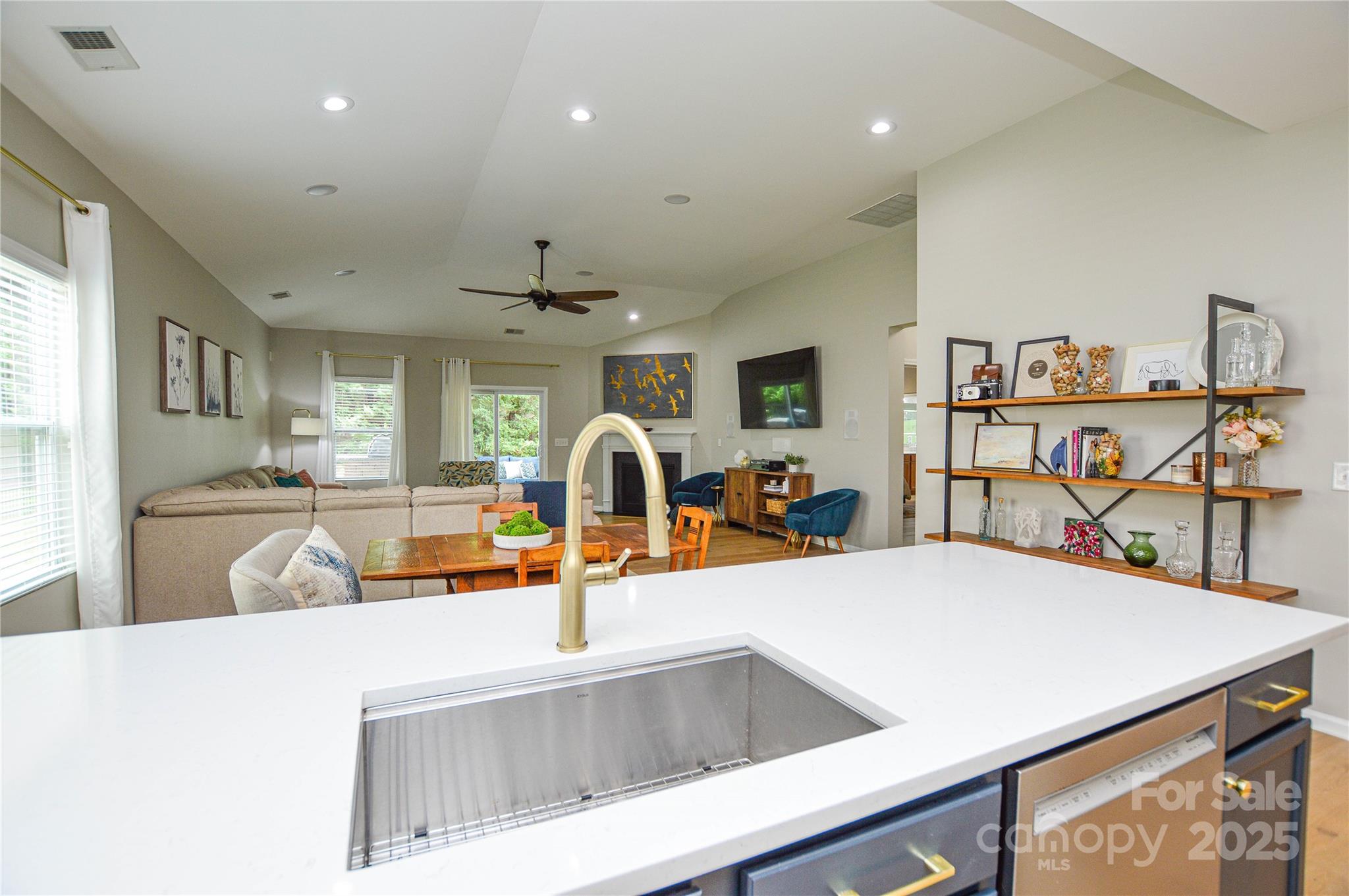 86506 Arrington Road Lancaster, SC 29720 - Photo 15 of 48 a kitchen with a sink a counter and chairs