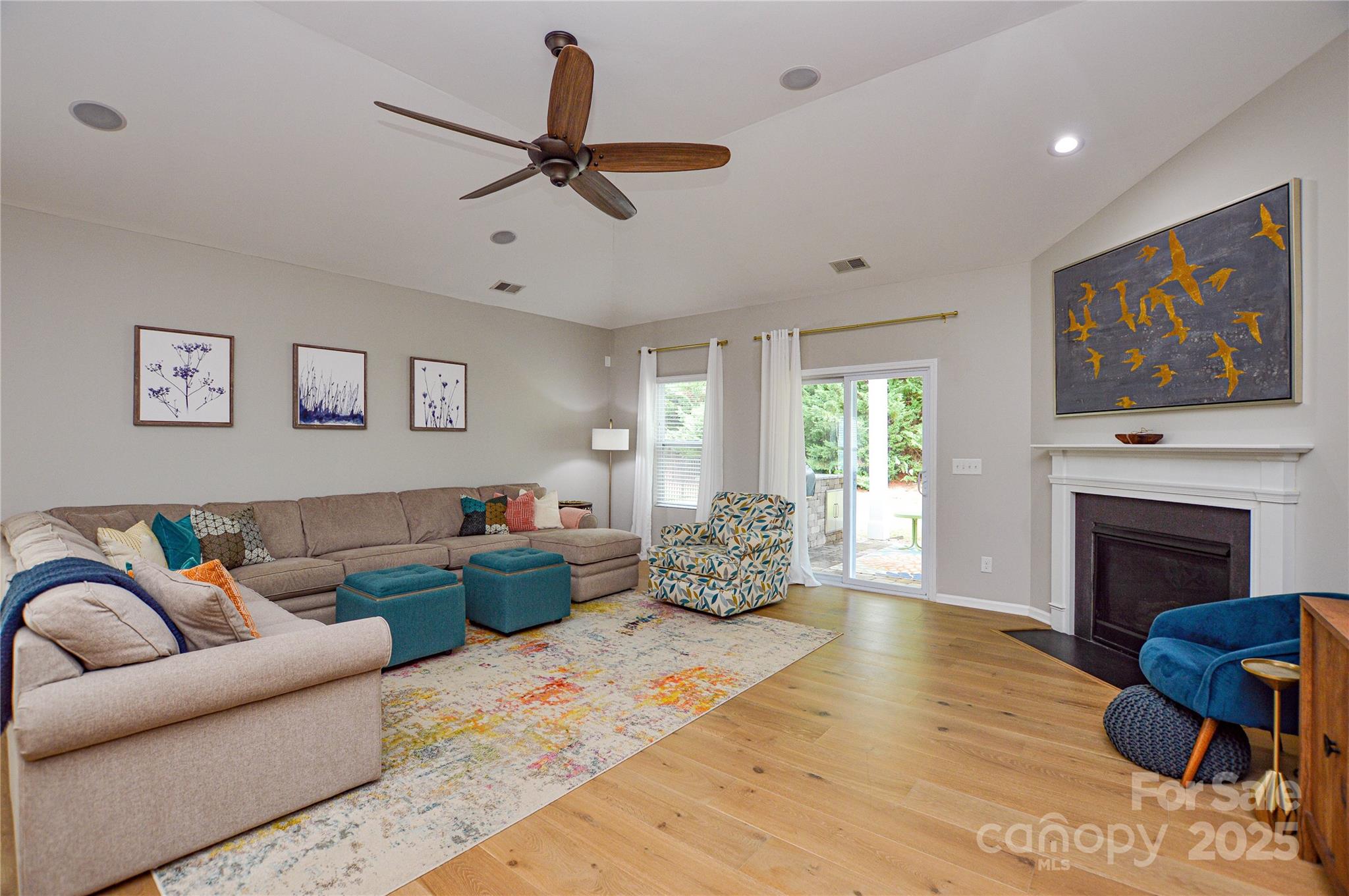 86506 Arrington Road Lancaster, SC 29720 - Photo 18 of 48 a living room with furniture and a fireplace