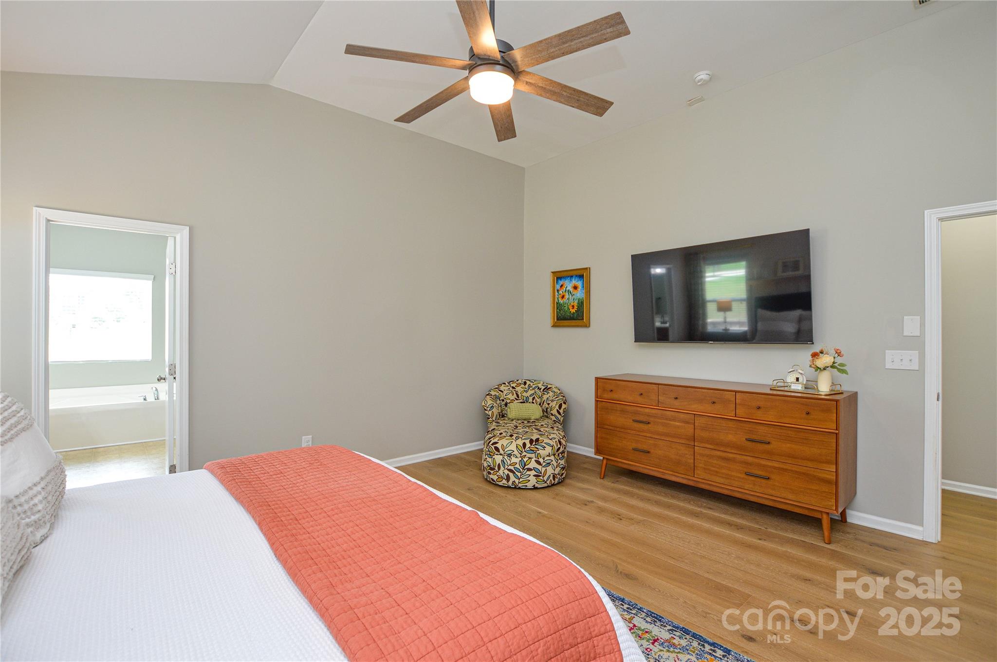 86506 Arrington Road Lancaster, SC 29720 - Photo 25 of 48 a bedroom with a bed and a flat screen tv