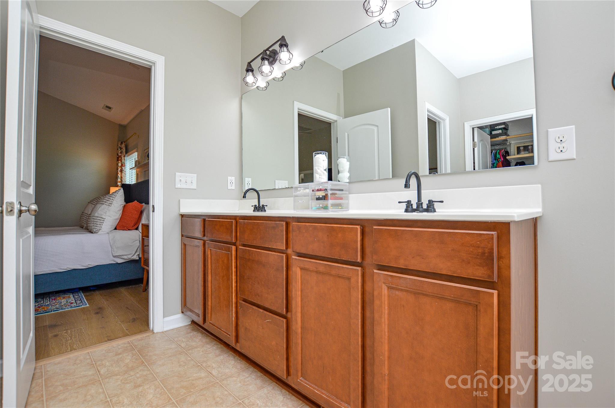 86506 Arrington Road Lancaster, SC 29720 - Photo 26 of 48 a en suite bathroom with a double vanity sink and a mirror