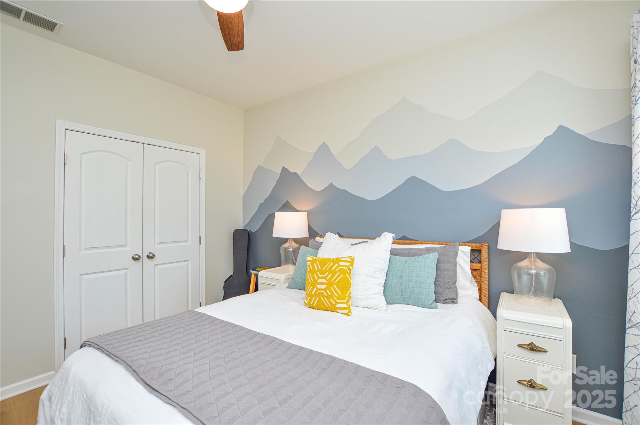 86506 Arrington Road Lancaster, SC 29720 - Photo 32 of 48 a bedroom with a bed and a painting on the wall