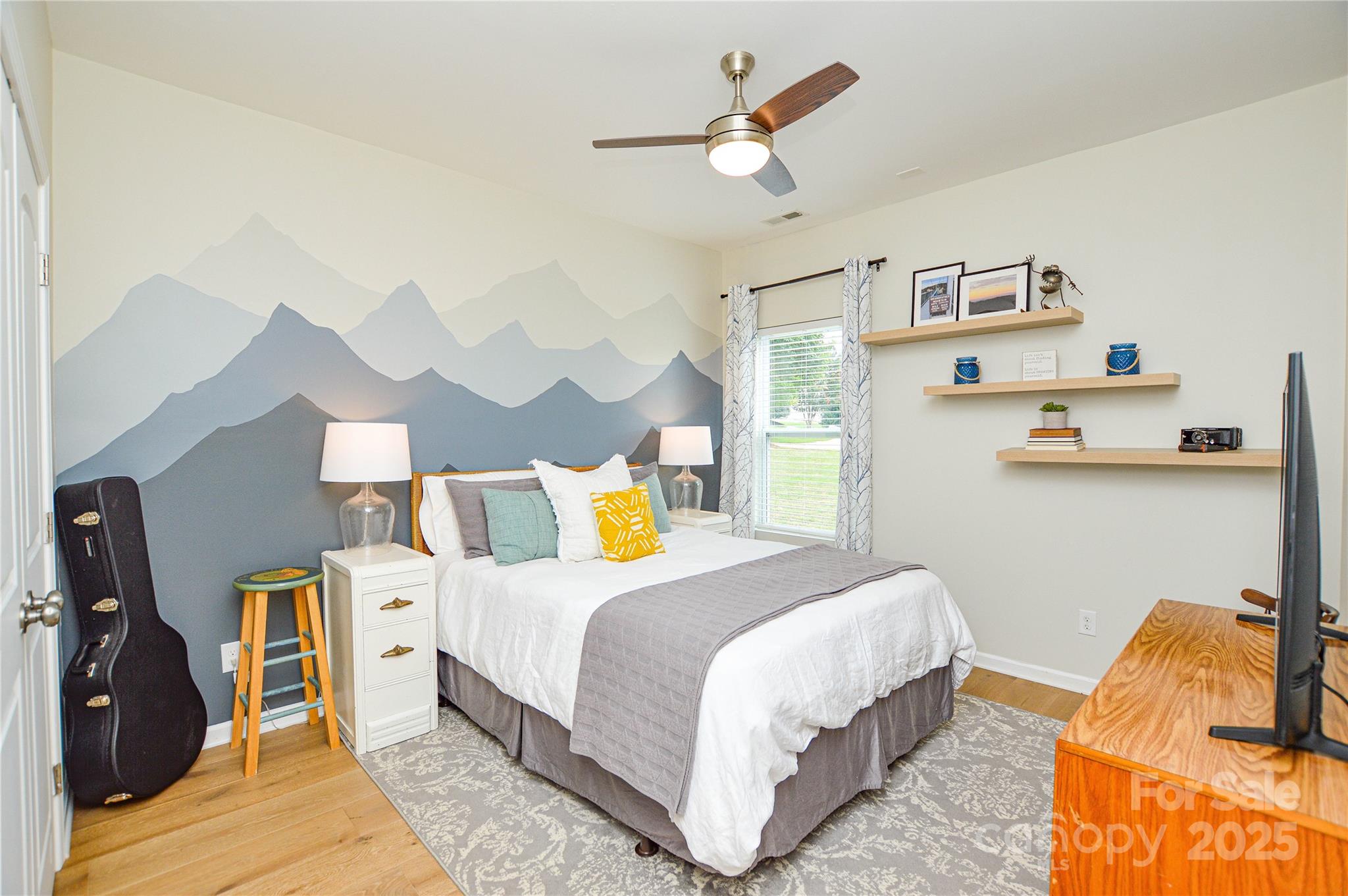 86506 Arrington Road Lancaster, SC 29720 - Photo 33 of 48 a bedroom with a bed and a chandelier