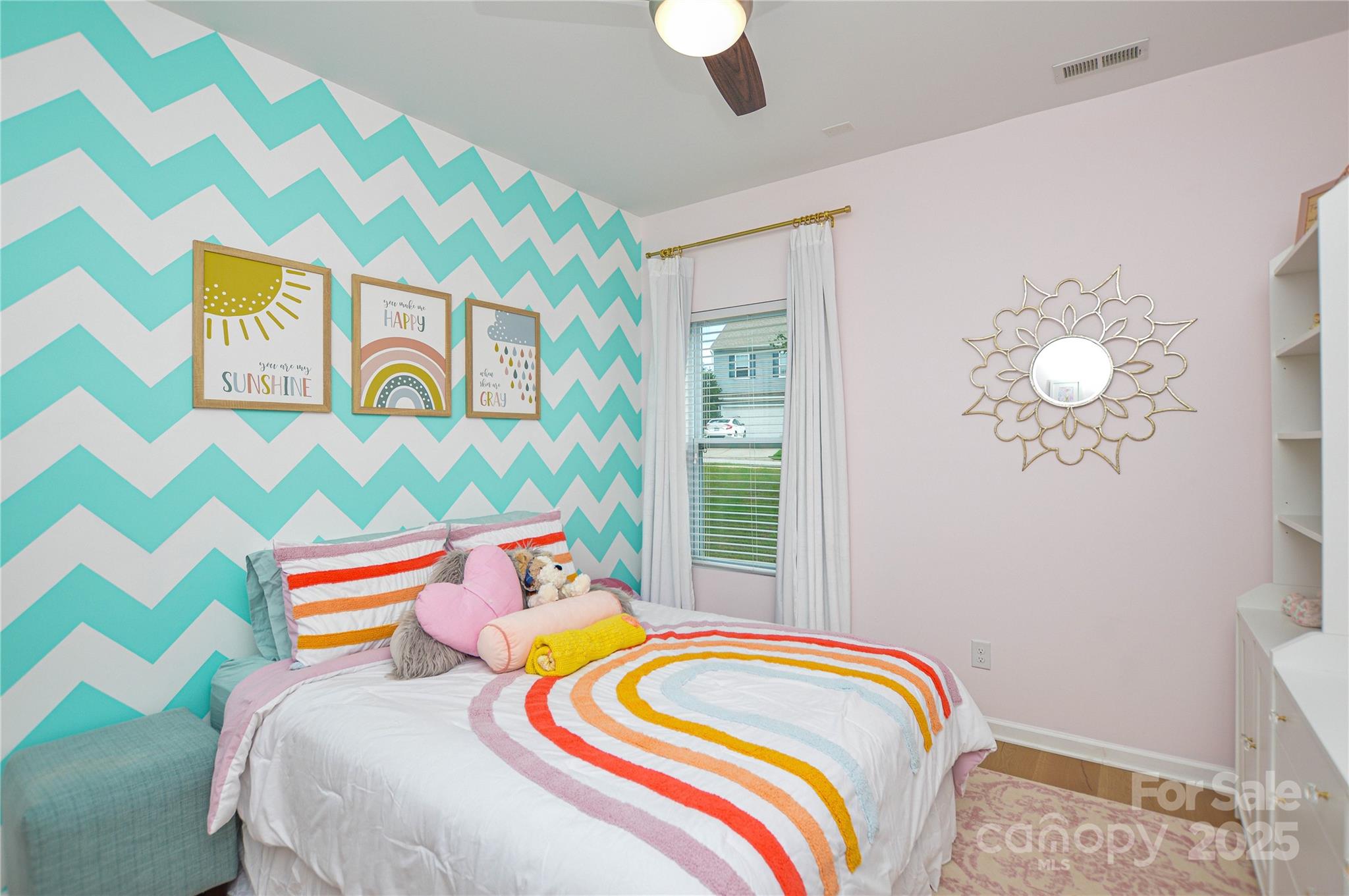 86506 Arrington Road Lancaster, SC 29720 - Photo 34 of 48 a bedroom with a bed and a painting on the wall
