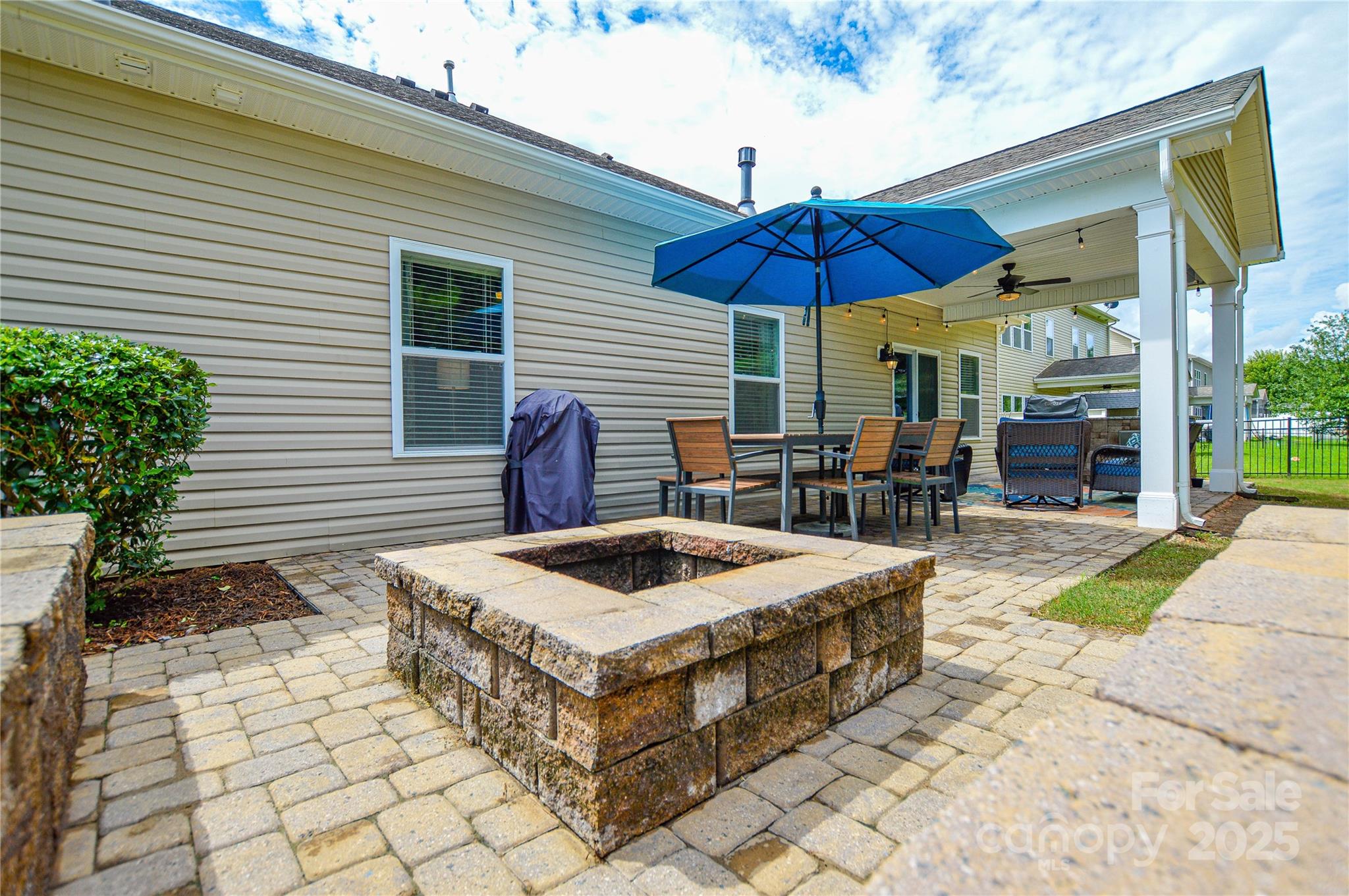86506 Arrington Road Lancaster, SC 29720 - Photo 45 of 48 a view of a patio with chairs and tables